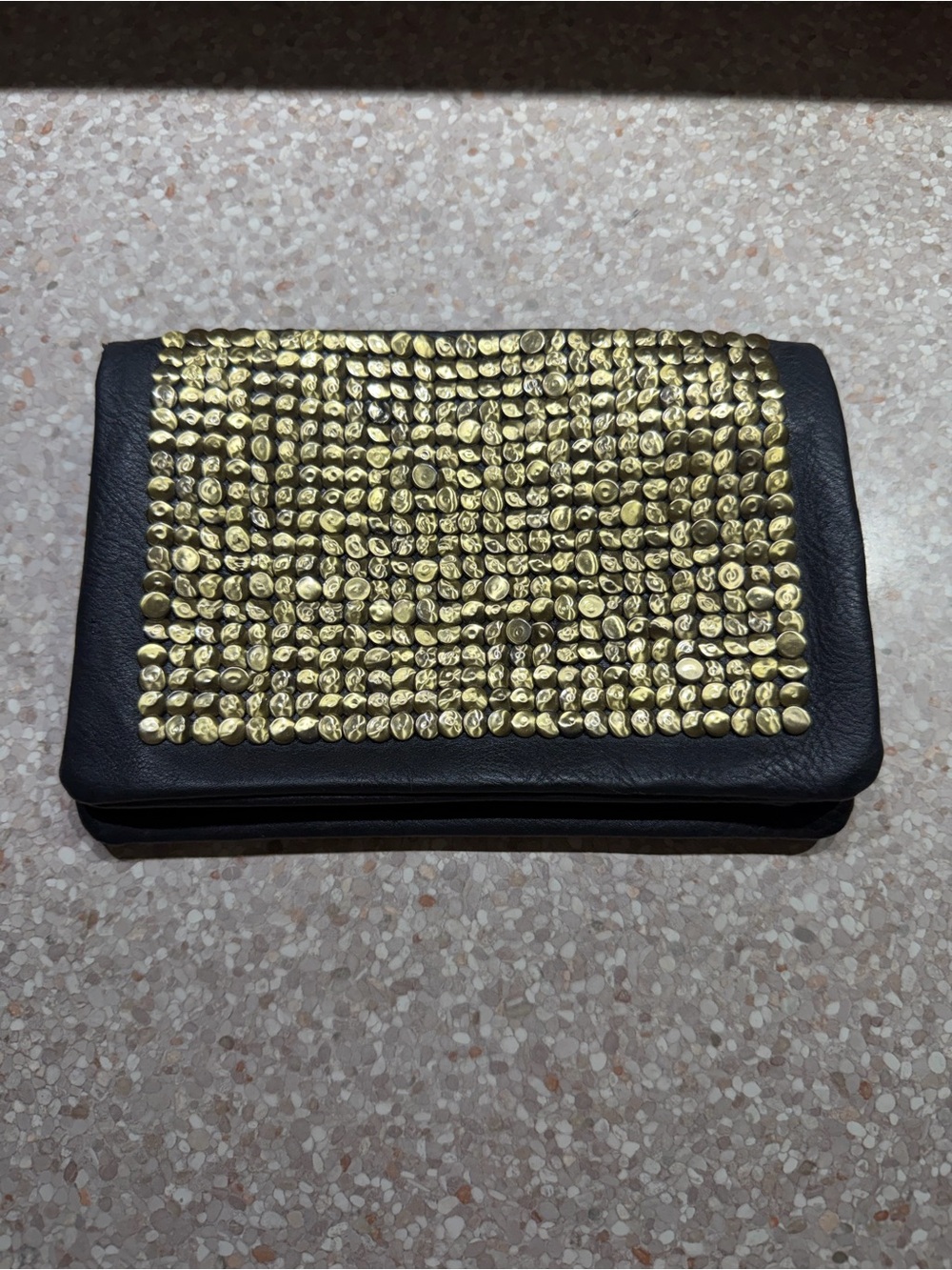 Black bag with gold accents